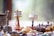 A close-up of beautifully crafted spiritual items displayed on a wooden table.