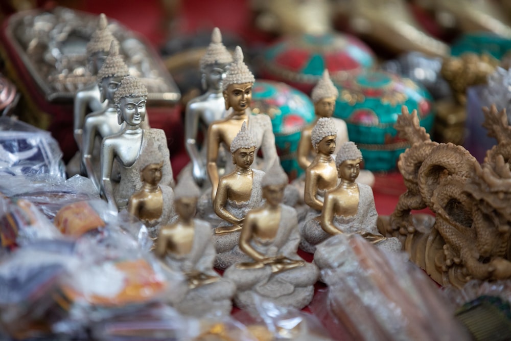 a group of statues sitting on top of a table