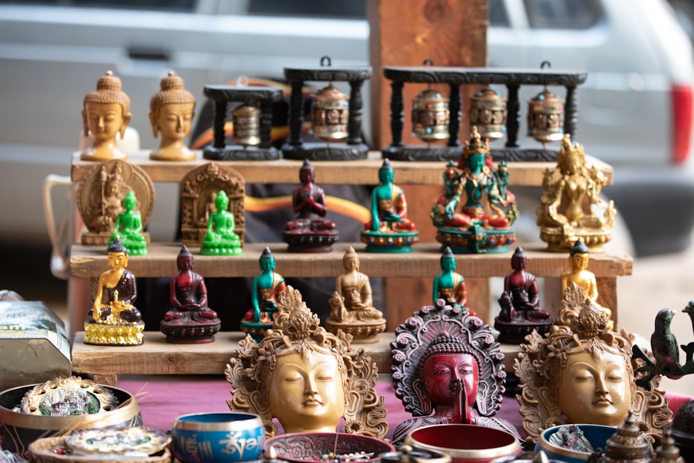 a table topped with lots of different types of figurines