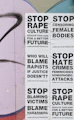 a bunch of stickers on the side of a wall