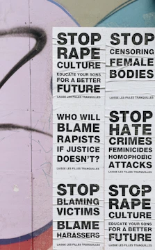 a bunch of stickers on the side of a wall