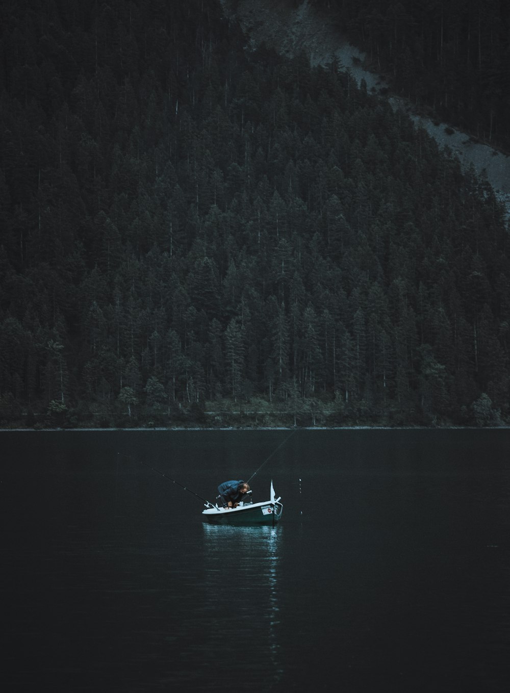 a small boat in a body of water