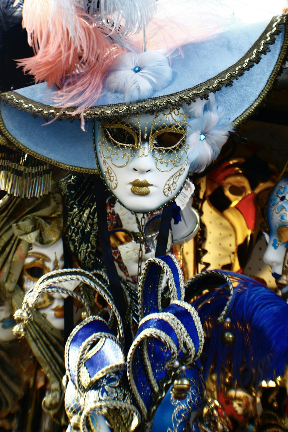 a person wearing a blue hat and a mask