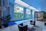 a living room with a pool in the middle of it