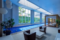 a living room with a pool in the middle of it