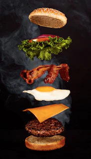 A vibrant burger photo transforming into a dynamic video clip with animated steam and price tag overlay