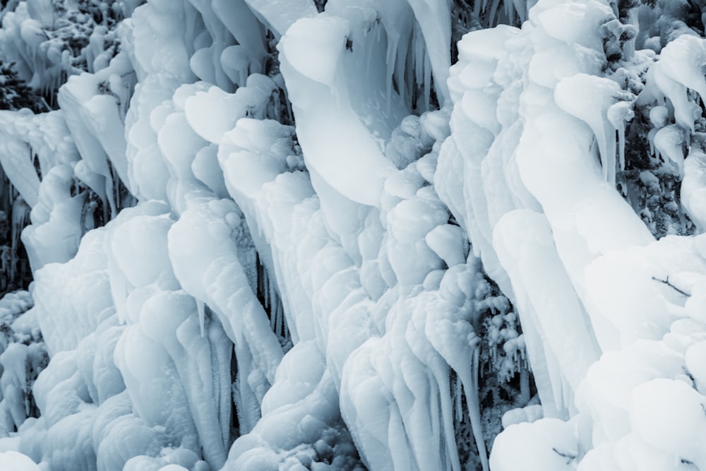 a group of ice formations in the snow