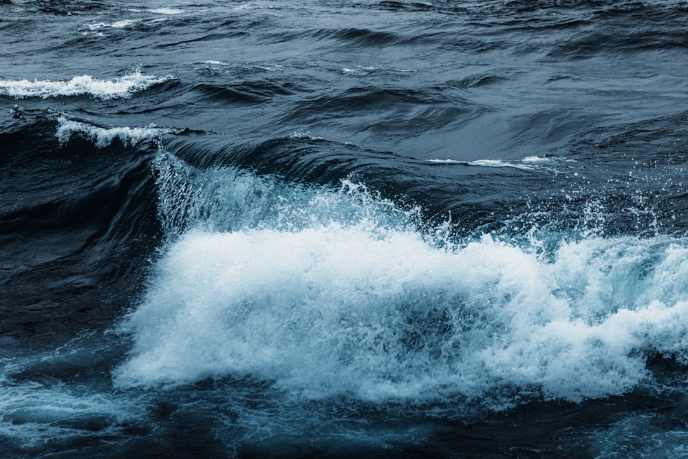 a large body of water with waves coming in