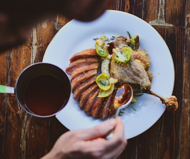 a plate of food and a cup of coffee