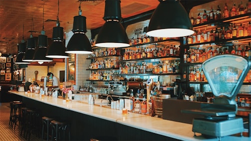 a bar with a lot of bottles on it