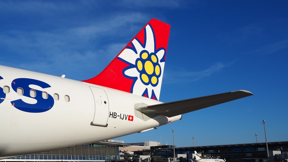 a large jetliner sitting on top of an airport tarmac