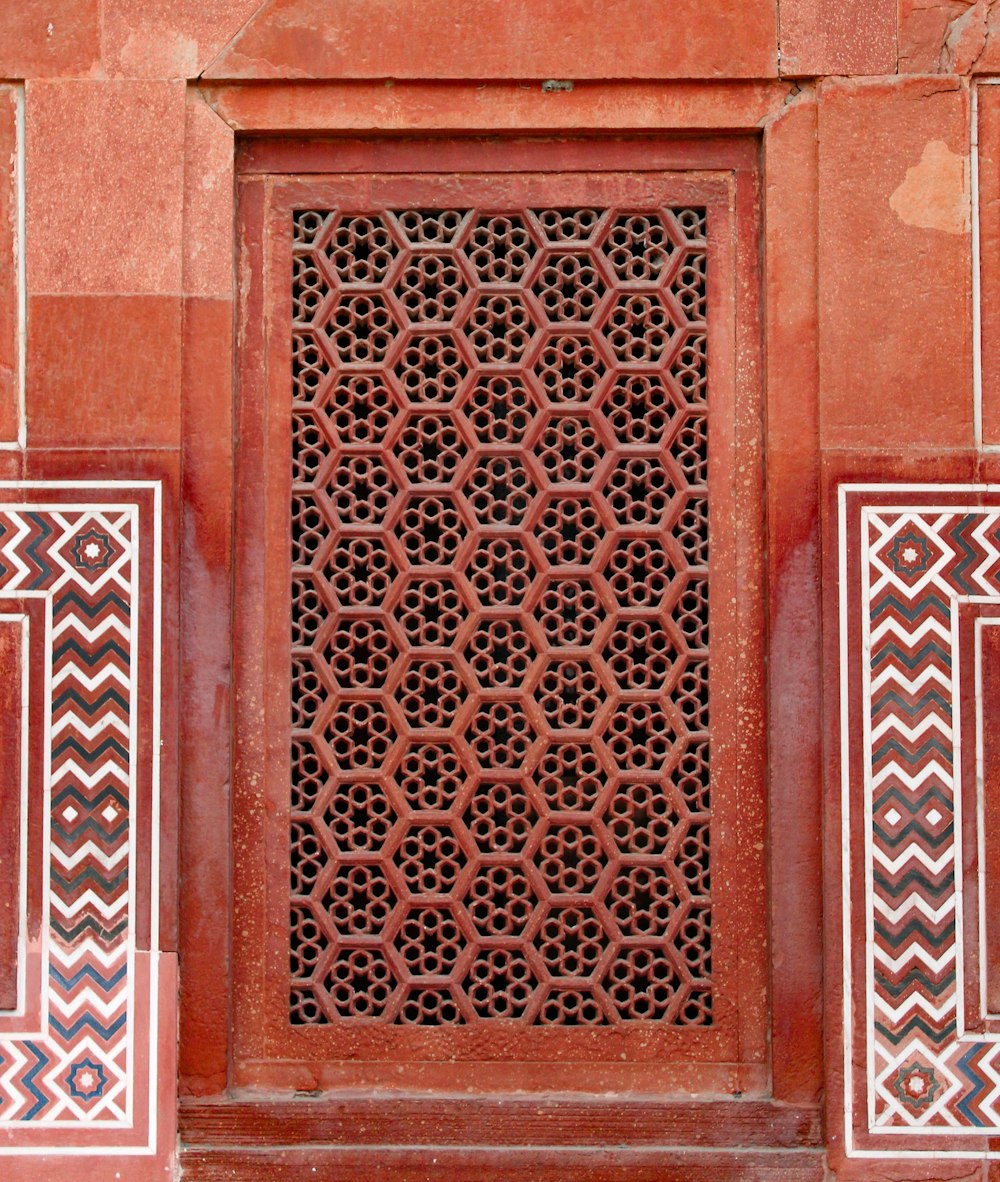 a close up of a decorative window on a building