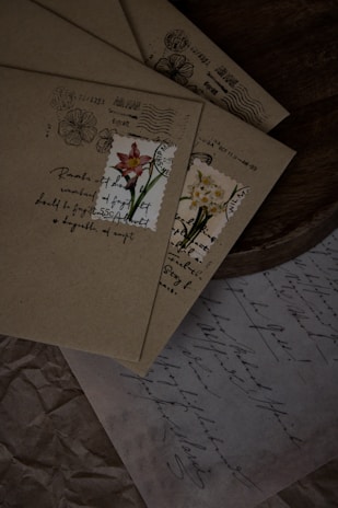 a close up of a piece of paper with flowers on it