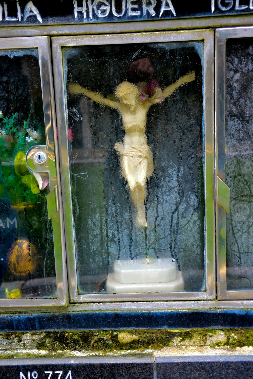 a statue of a person in a window
