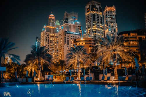 a large swimming pool surrounded by tall buildings