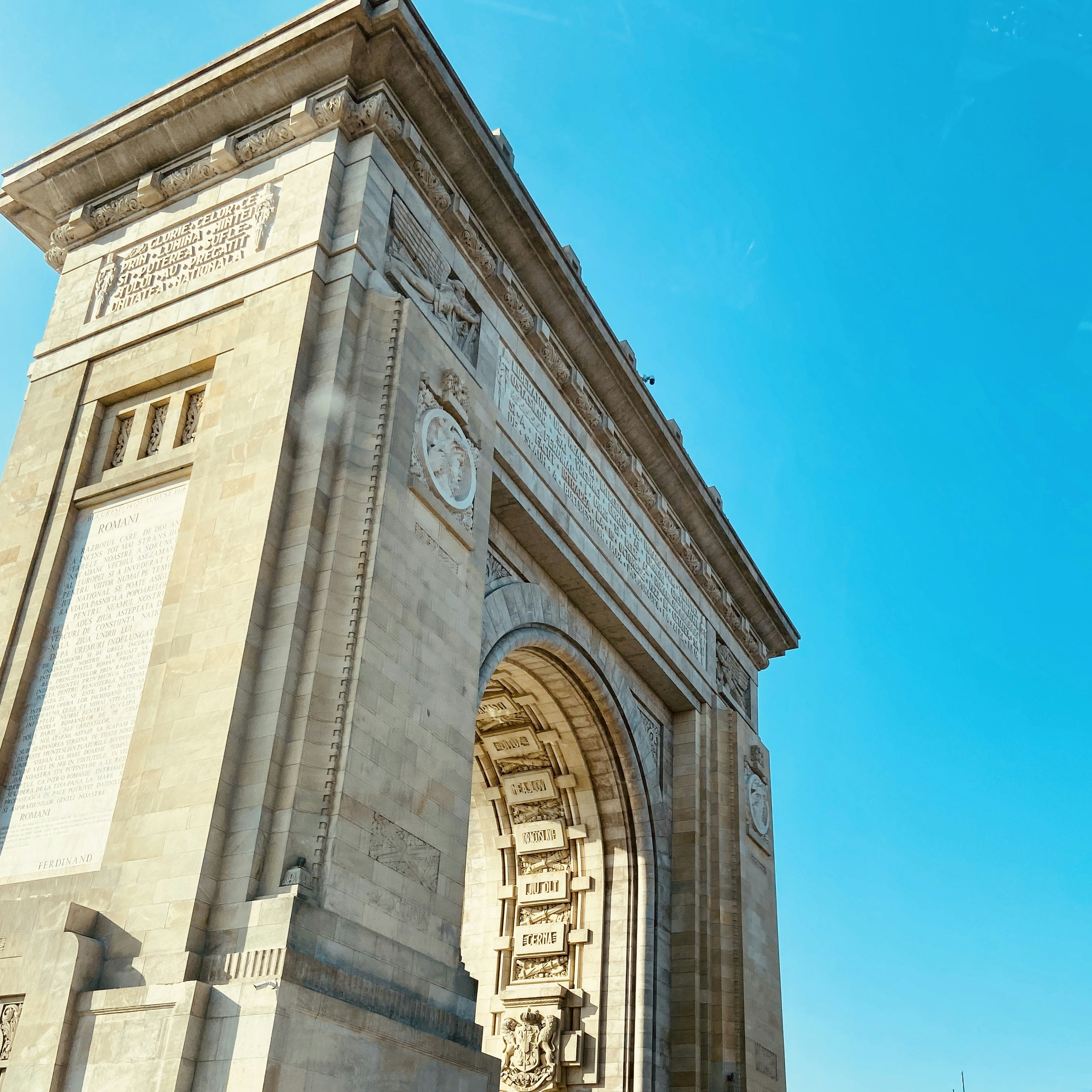 a very tall building with a clock on it's side