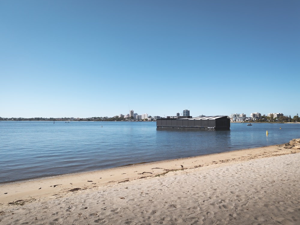 a large boat floating on top of a body of water