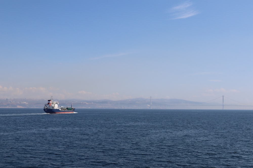 a large boat in the middle of a large body of water