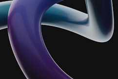 a black background with a purple and blue design