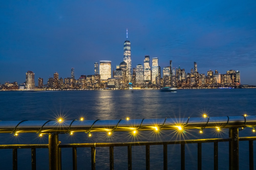 a view of a city at night from across the water