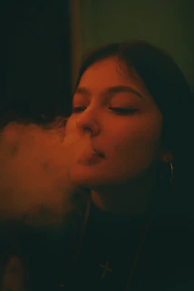 A cozy setup with a smoke machine gently filling the air with mist, inviting inquiries.