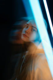 A dynamic portrait of Arley Lozano in an industrial setting with dark-mode tones and energy green highlights.