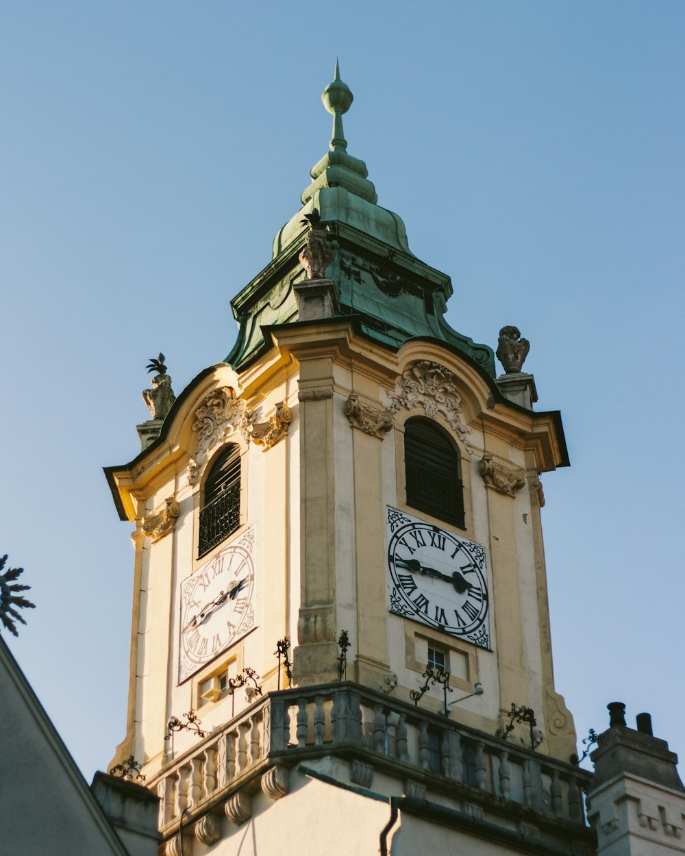 a large clock tower with a sky background