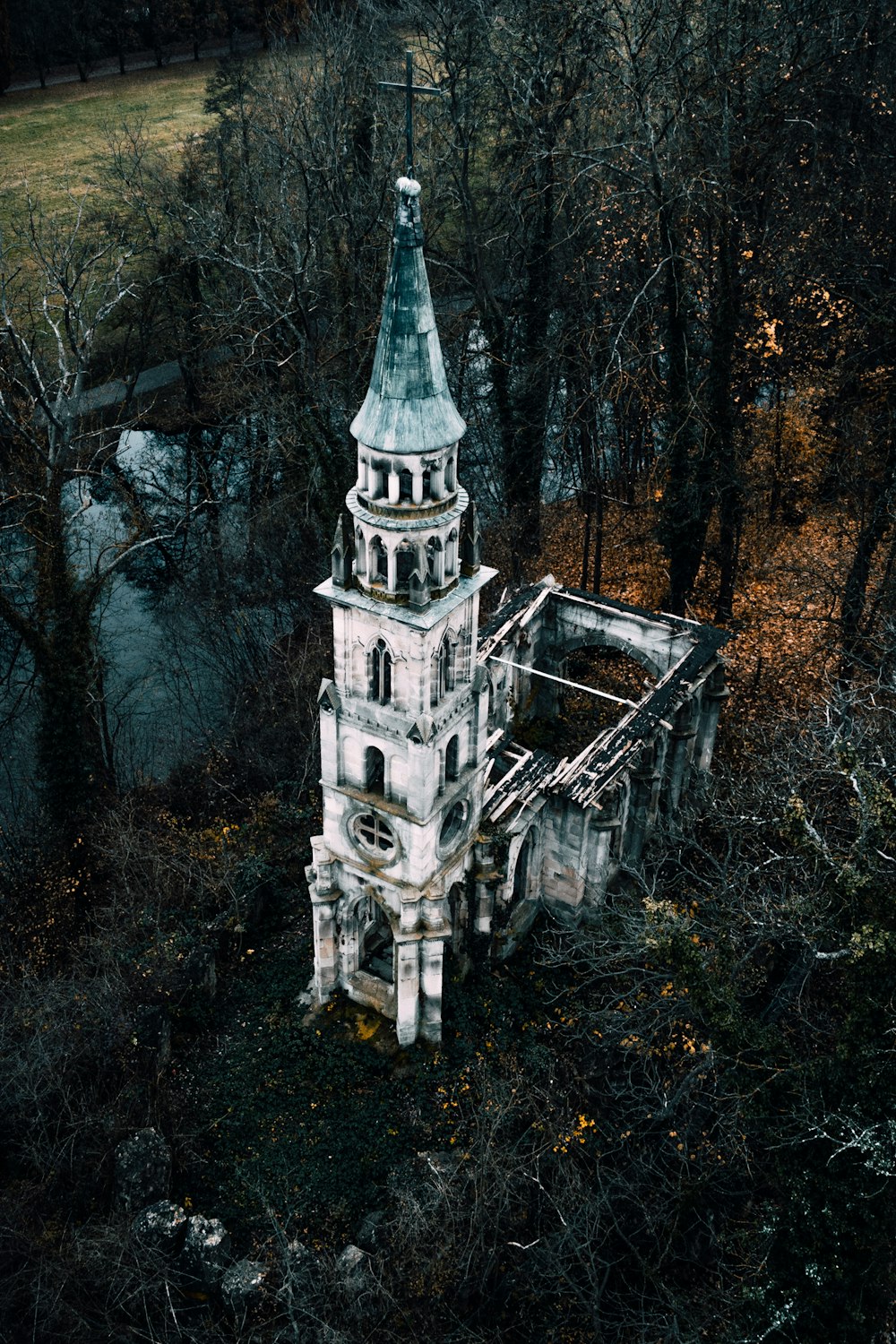 an old church in the middle of a forest