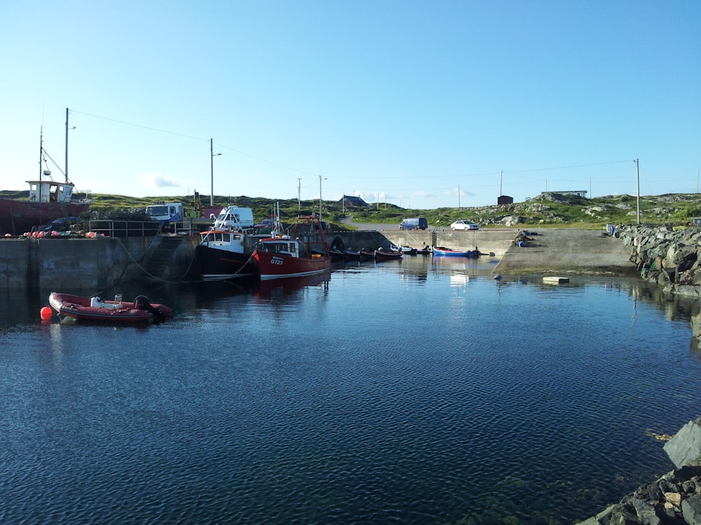 a body of water with a bunch of boats in it