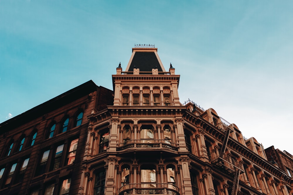 a tall building with a clock on the top of it