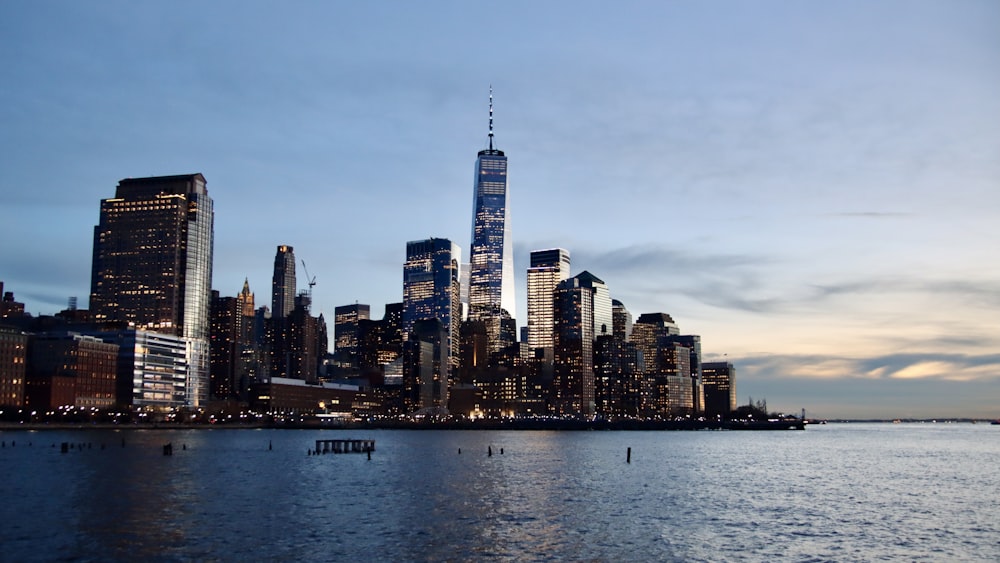 a view of a city at night from the water