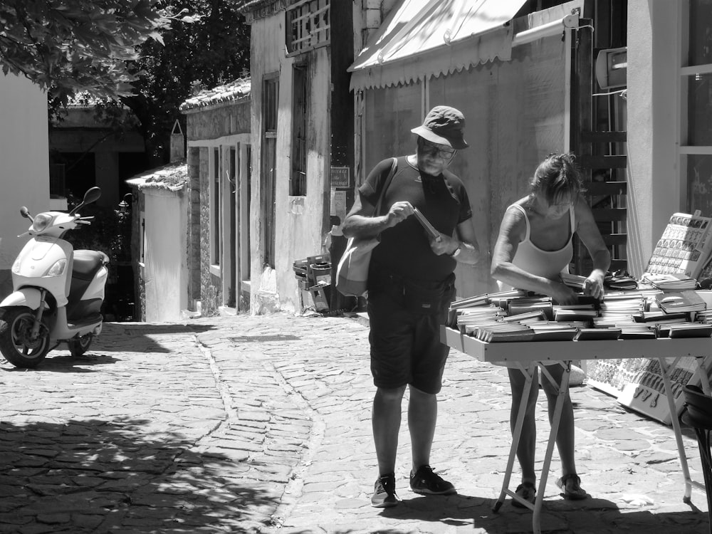 a couple of people that are standing in the street