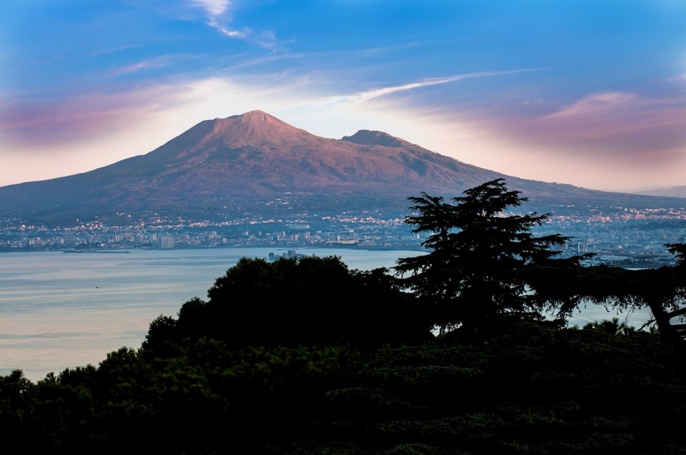 a view of a mountain and a body of water