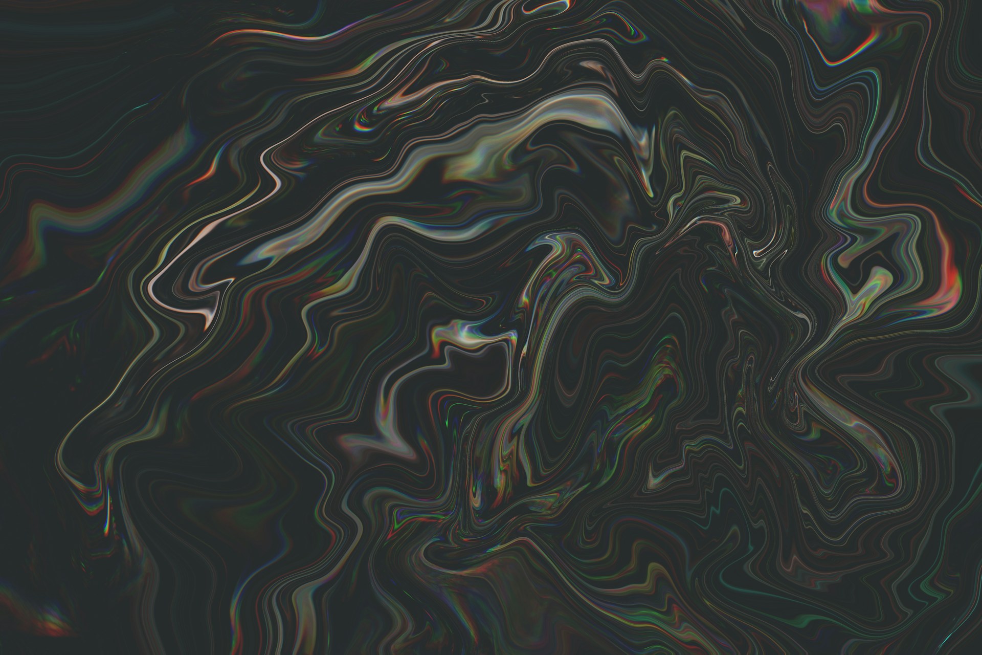 a black and white photo of a swirl pattern