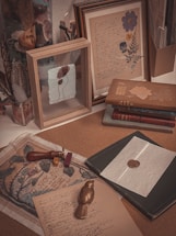 A warm, inviting desk with traditional Madhubani art supplies and a handwritten letter ready to be sent.