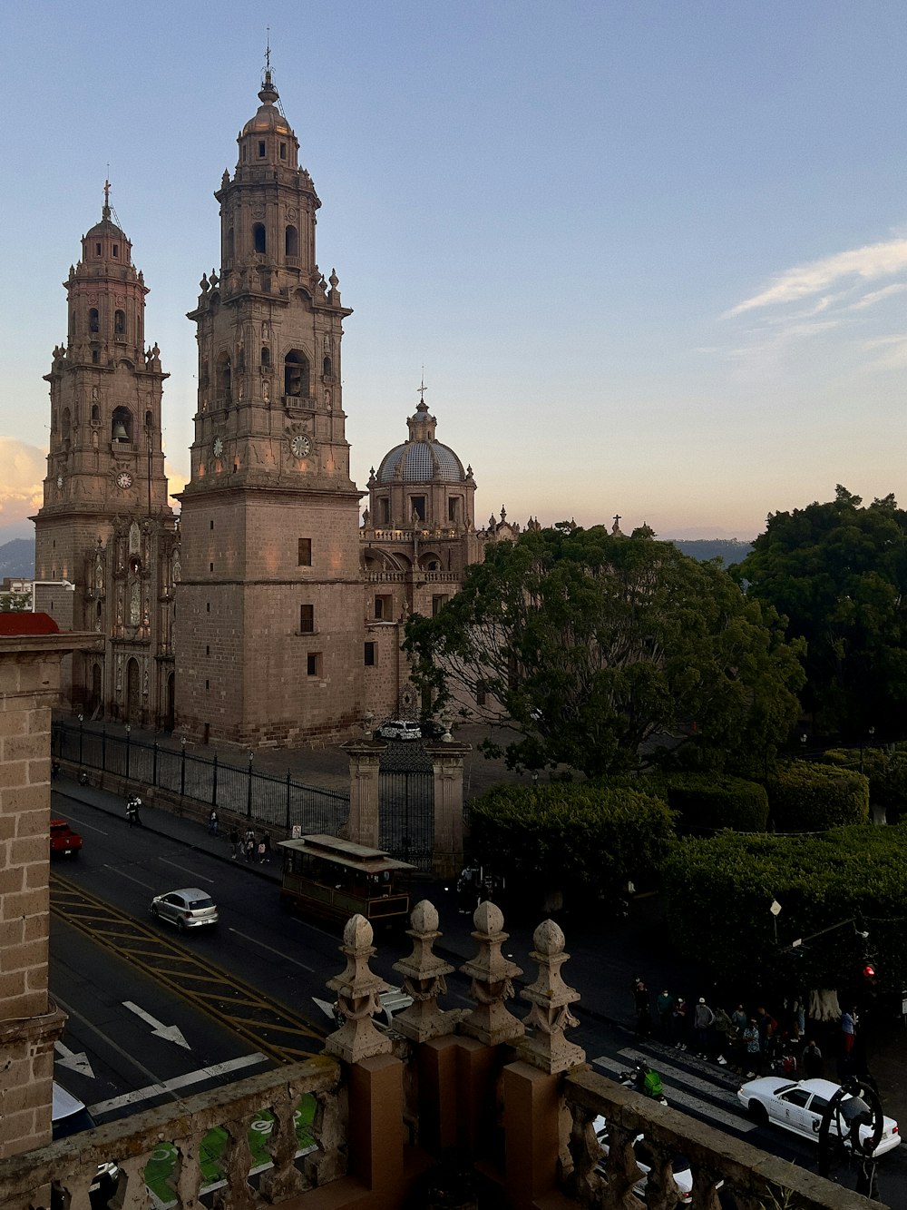 a view of a large building with two towers