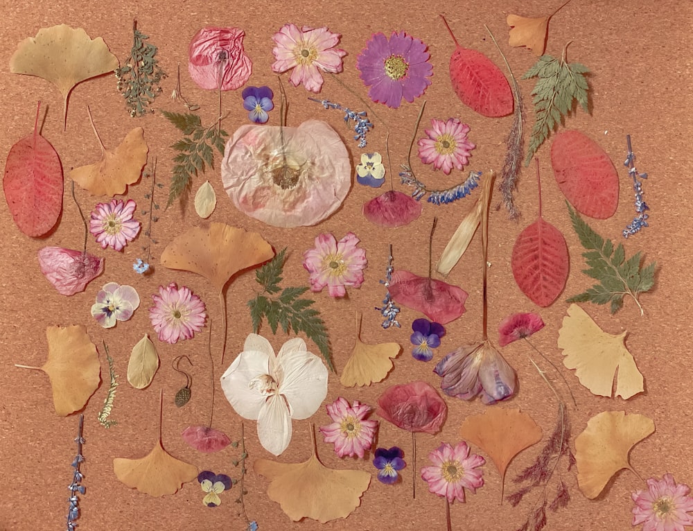 a bunch of flowers that are on a table