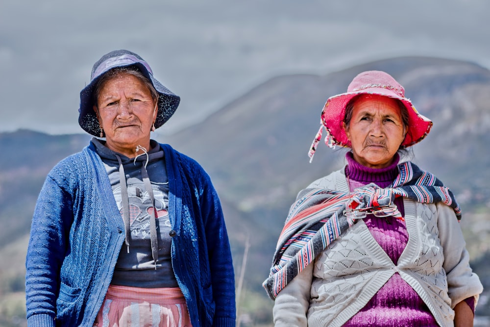 a couple of women standing next to each other