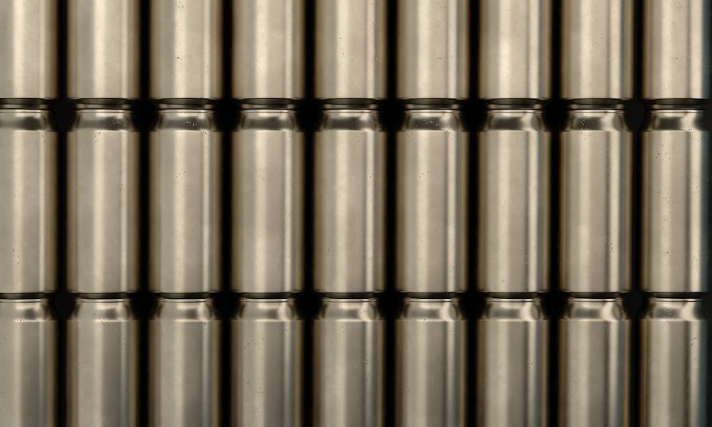 a close up of a metal structure with many tubes