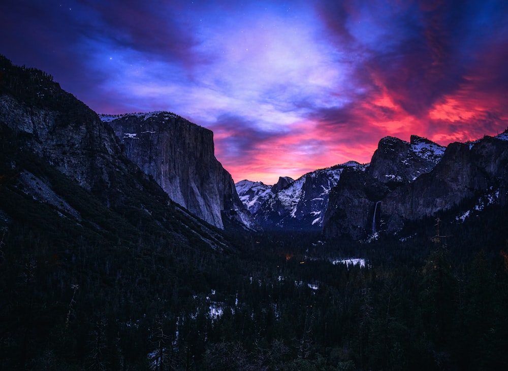 a beautiful sunset in yosep valley with mountains in the background