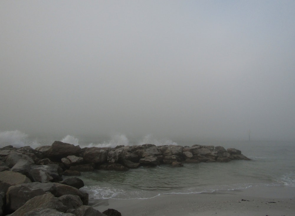 a large body of water surrounded by rocks