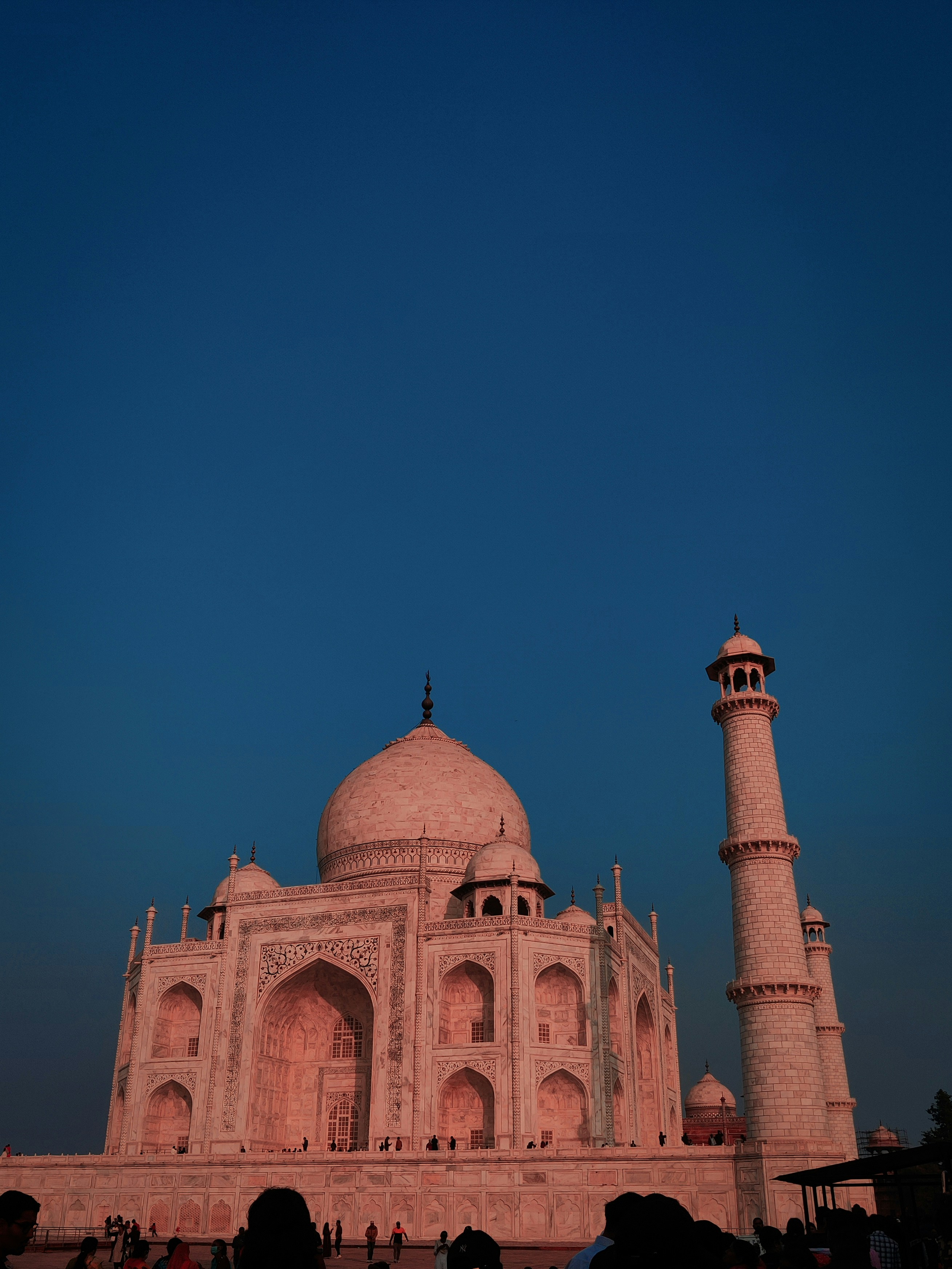 a large white building with a tall tower