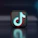 a black and blue icon with the letter j on it