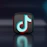a black and blue icon with the letter j on it