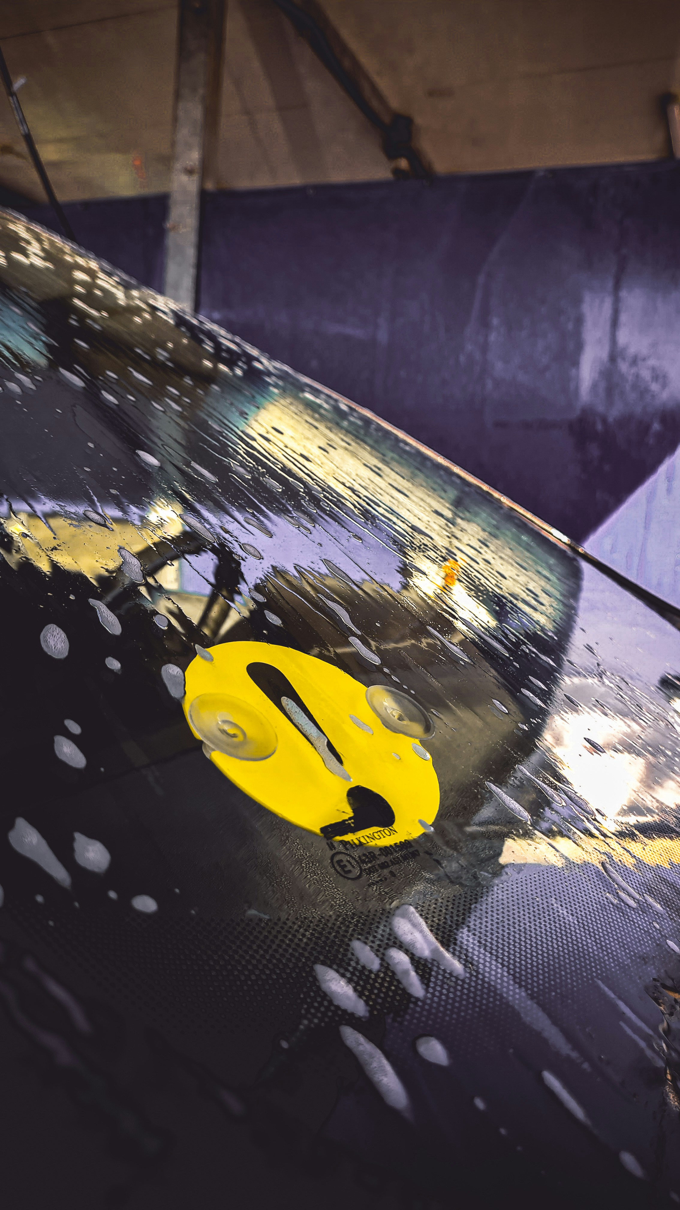 Close-up of a clean car hood and paint finish