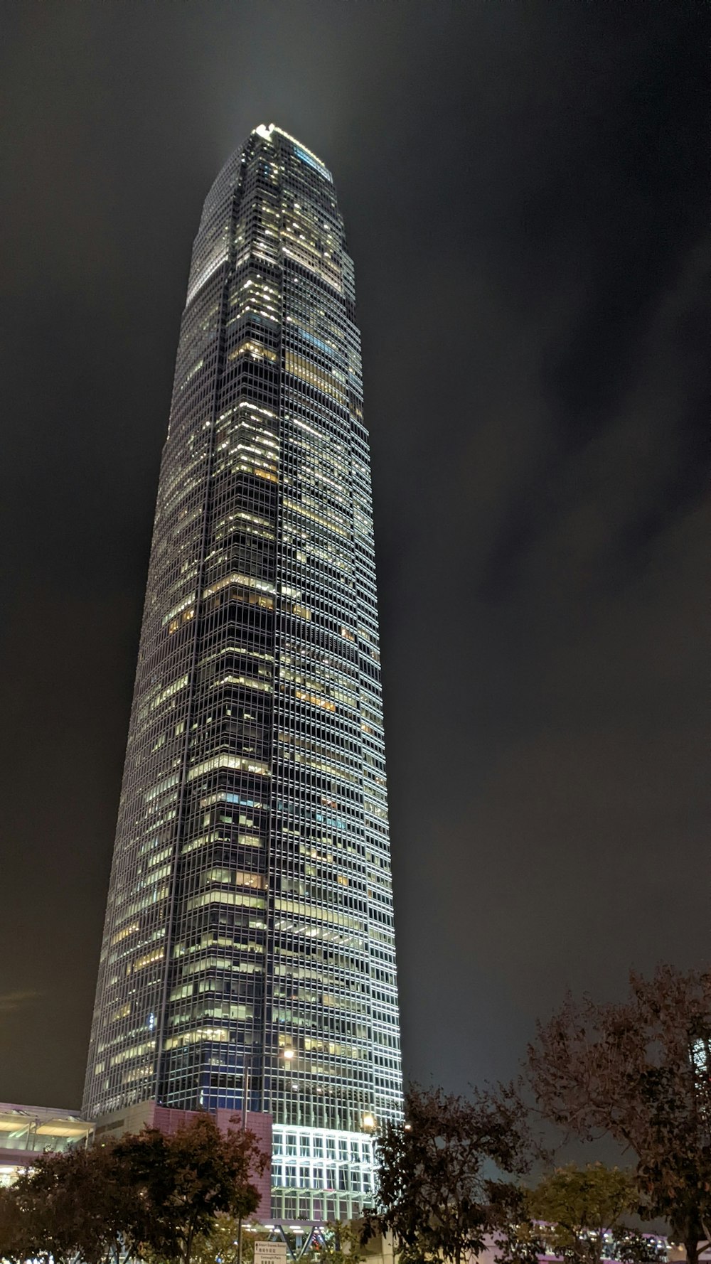 a very tall building lit up at night