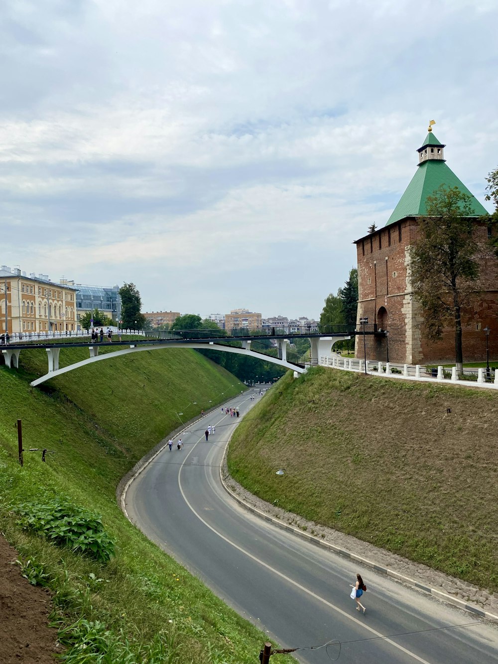 a person riding a skateboard down a curvy road