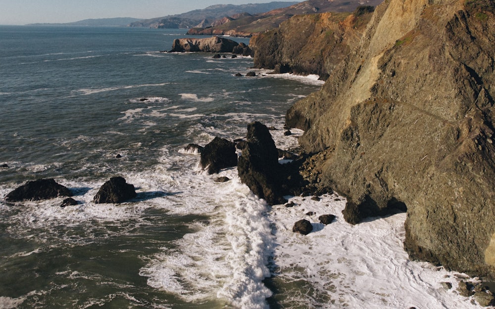 a view of the ocean from a cliff