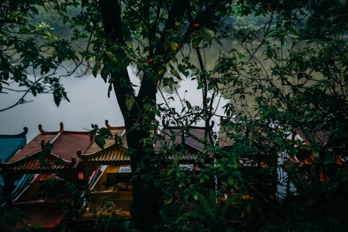 A serene riverside villa with traditional Khmer architecture.