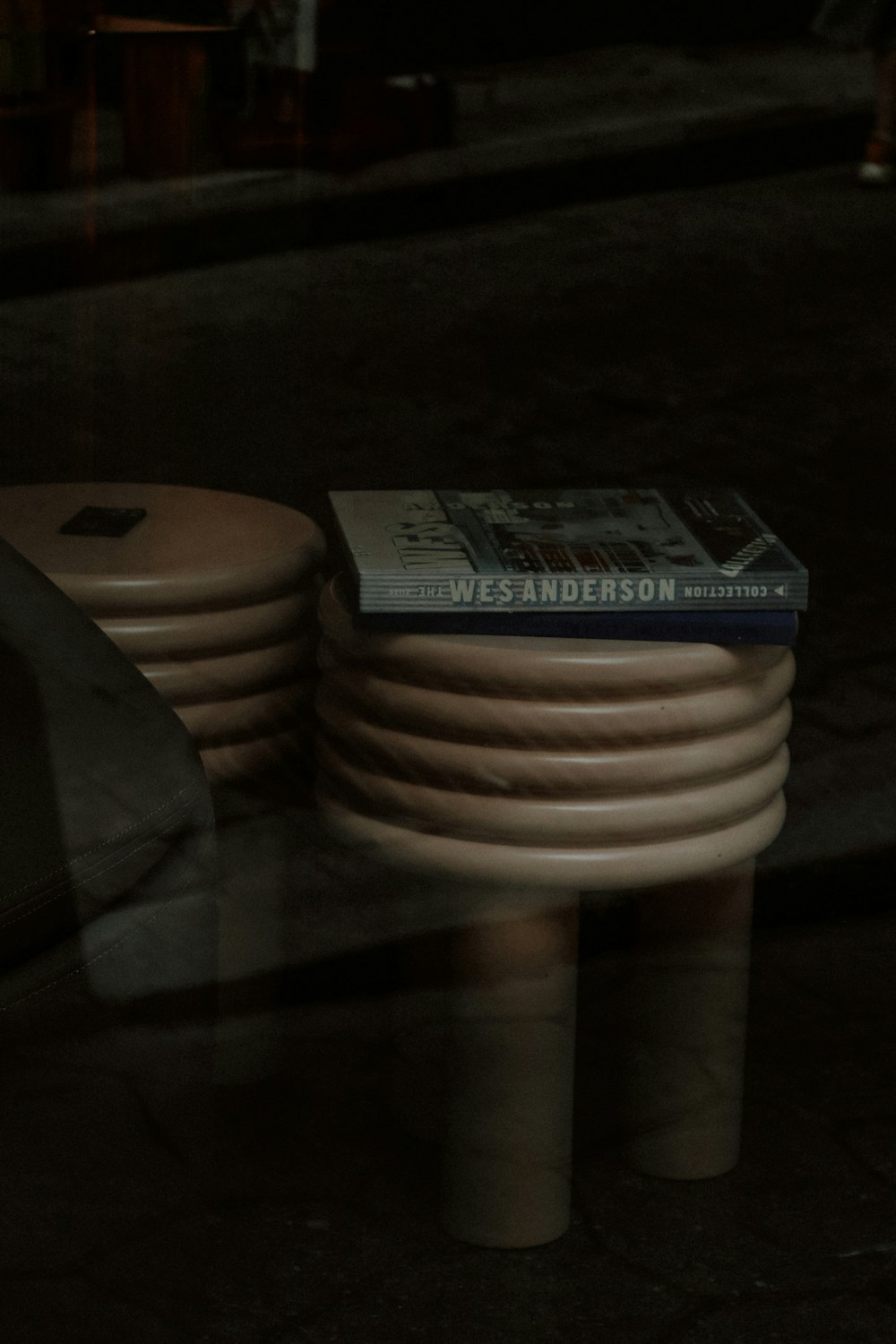 a stack of books sitting on top of a table